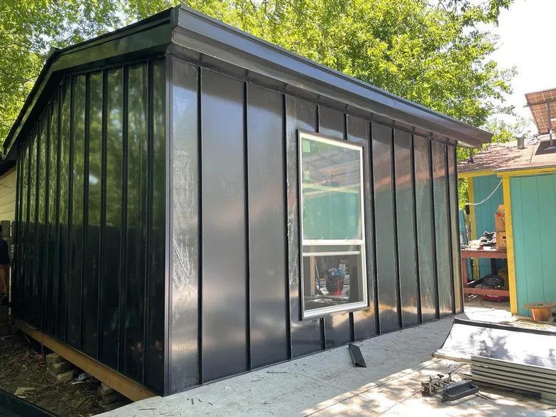 Black standing seam metal wall panels for Metal Roof Installation in North Fayette